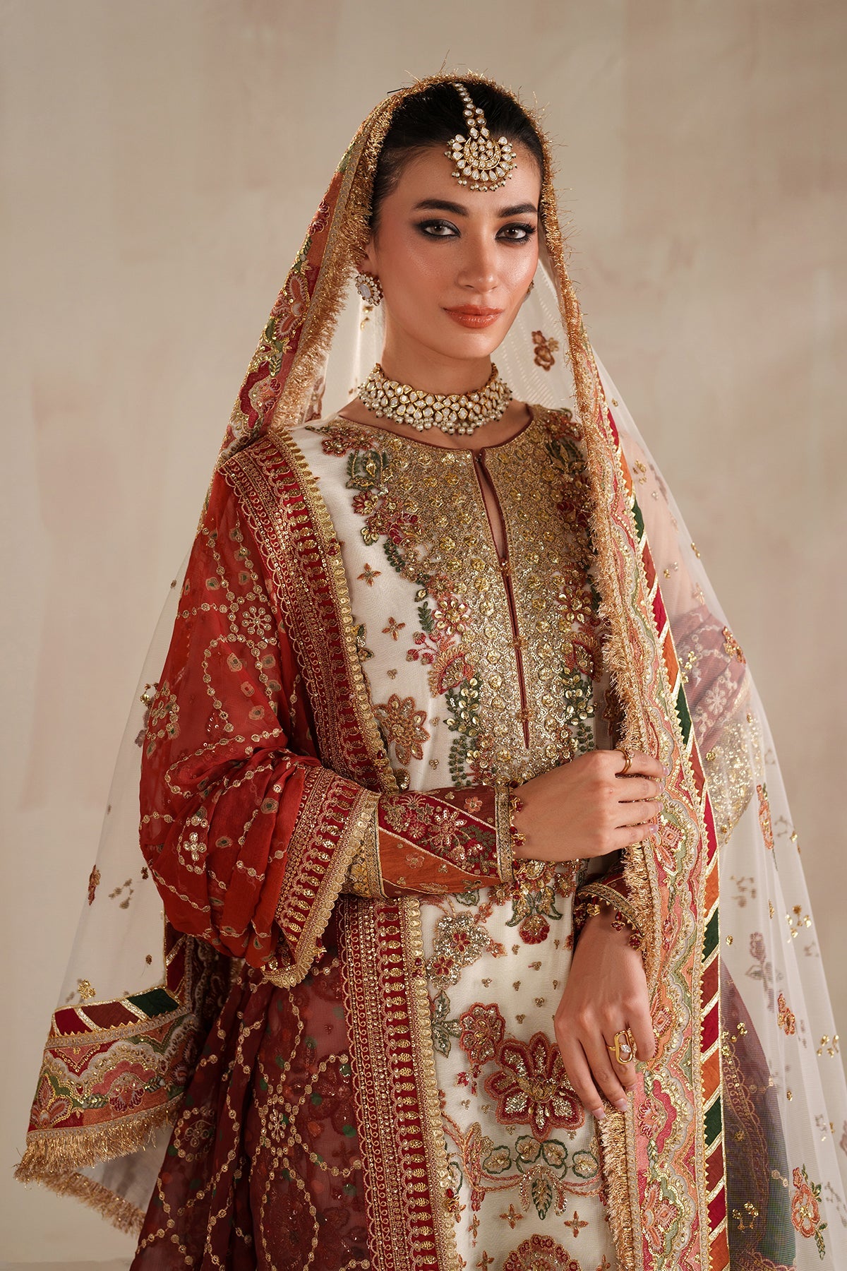 Intricately detailed unstitched Baroque designer ensemble with matching embroidered silk dupatta