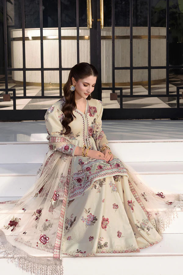 Model sitting wearing So Kamal premium floral lawn suit, sophisticated ethnic party wear