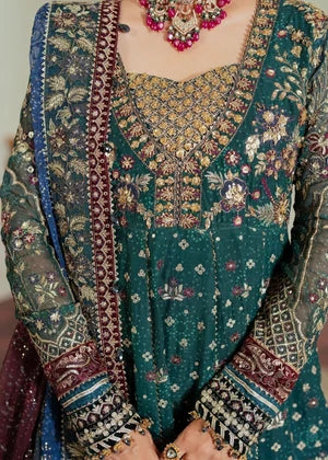 Close-up of intricate gold embroidery and velvet borders on Baroque teal maxi, best Pakistani boutique collection online in Bangladesh.