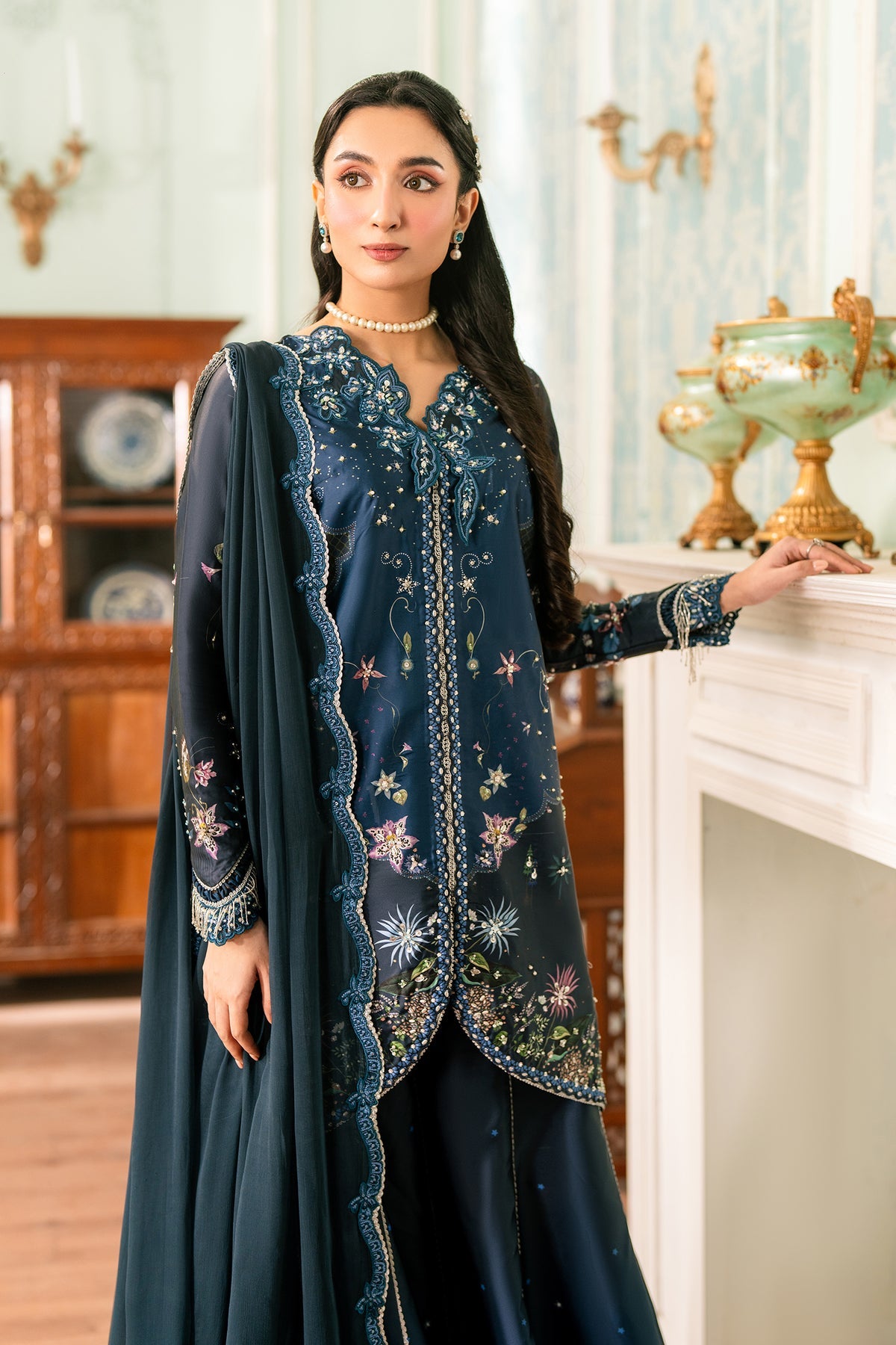 Model wearing Qalmakar Nerina luxury silk outfit with chiffon dupatta, buy original Pakistani designer dresses online in BD at Tajori.