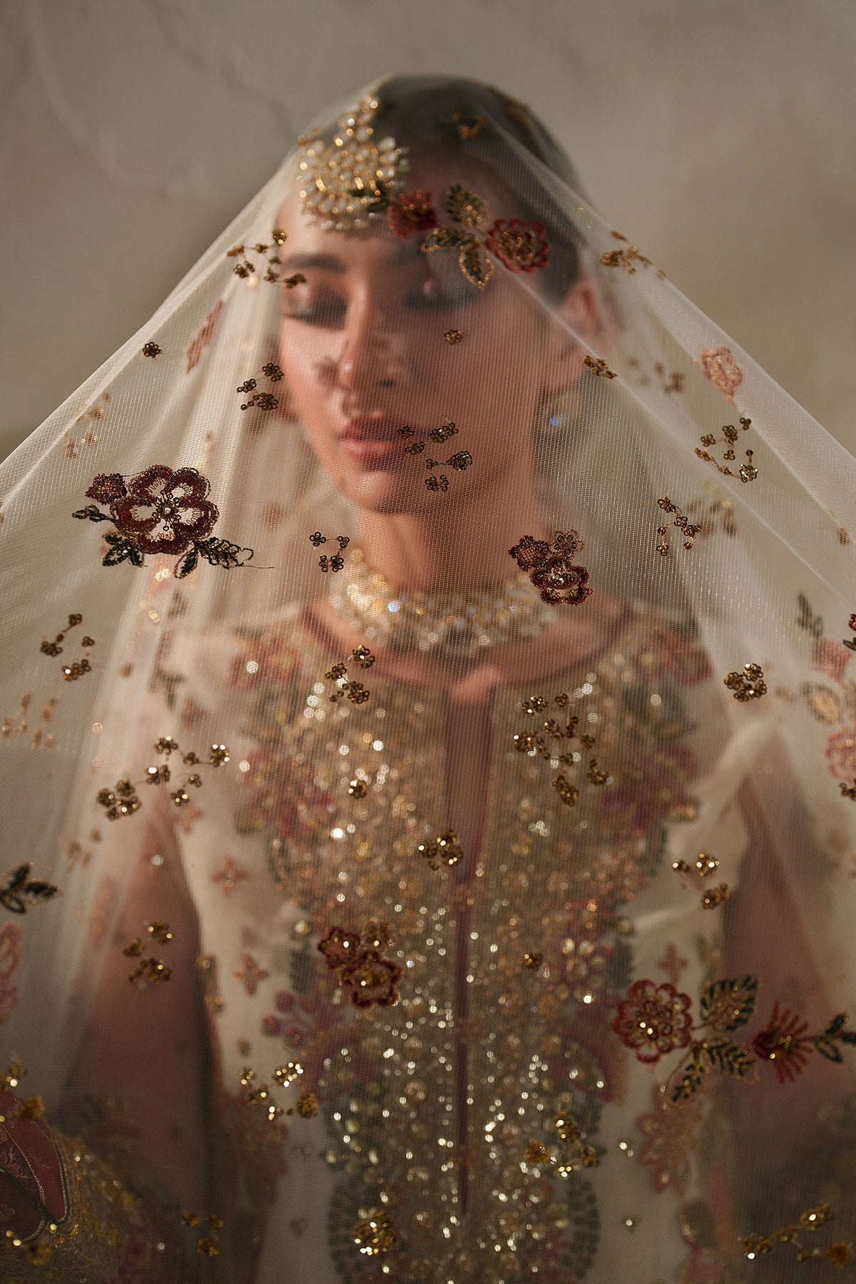 Luxury festive attire for women featuring authentic Baroque Pakistani designer embroidery patterns.