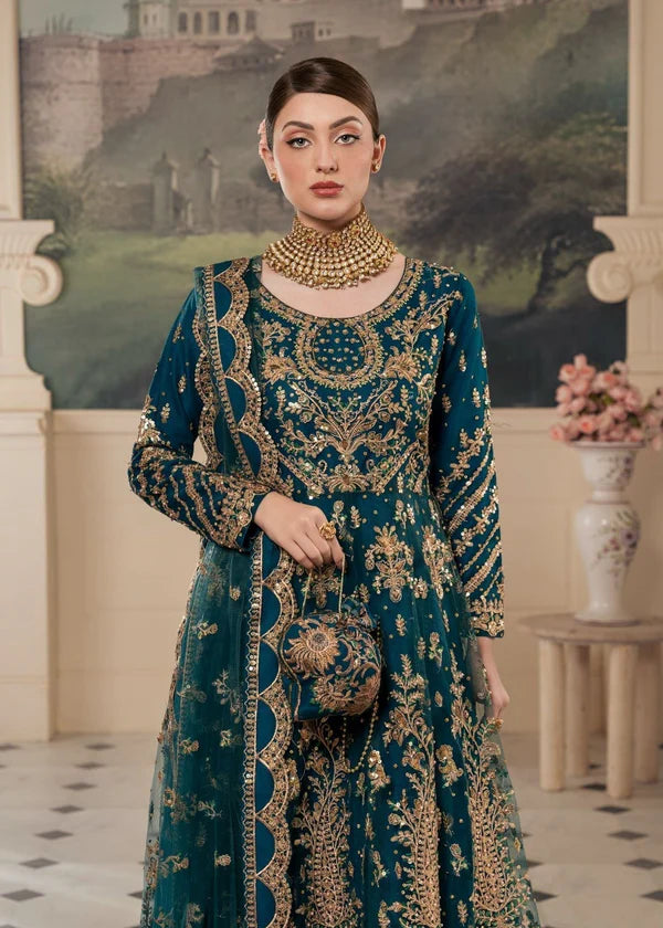 Standing pose in Haseens Official Heera cobalt blue stitched anarkali maxi