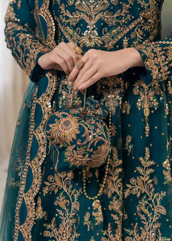 Close-up of Haseens Official Heera cobalt blue embroidered handbag and skirt detail