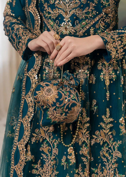 Close-up of Haseens Official Heera cobalt blue embroidered handbag and skirt detail