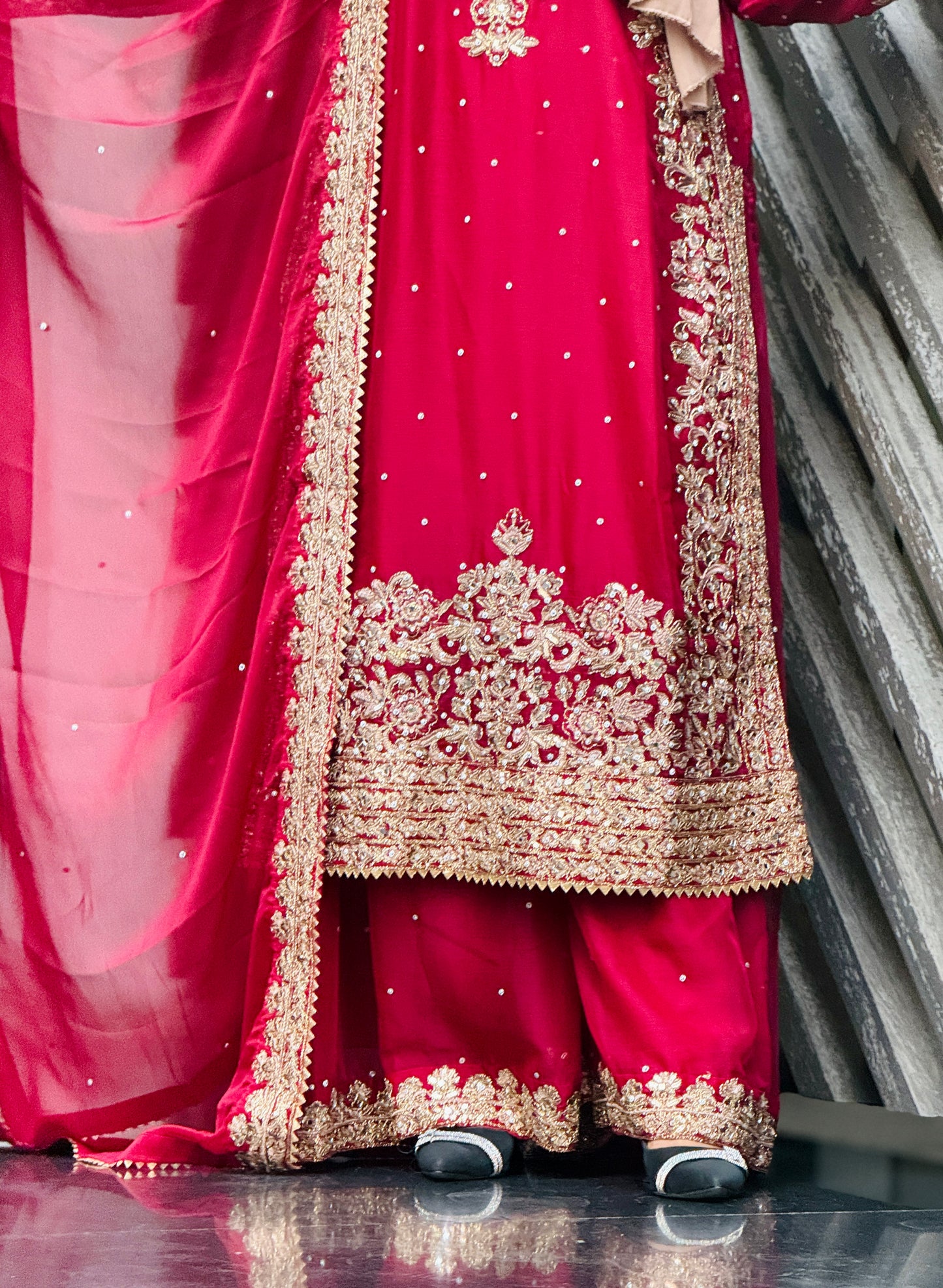Model wearing Haseens Official Lamyah maroon 3 piece and 4 piece sharara set, get best Pakistani unstitched and stitched suits online at Tajori.