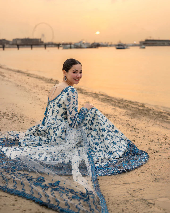 Sophisticated blue and white floral embroidered lawn suit worn by Hania Aamir, Jehona collection