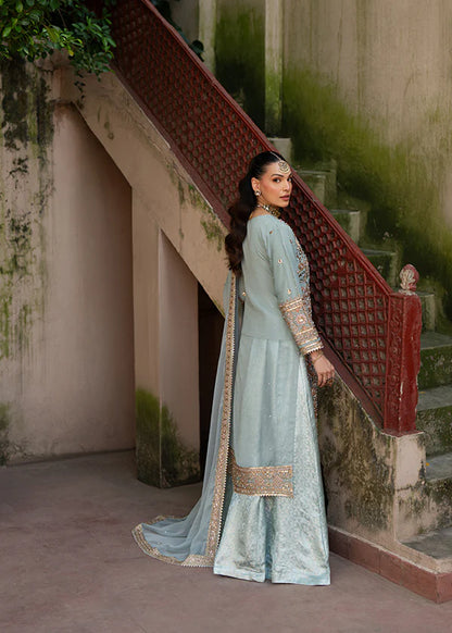 Back view of luxury stitched lehenga silhouette with premium embroidery details