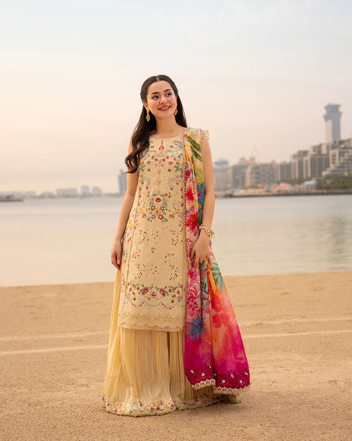 Standing pose of Hania Aamir in Faiza Saqlain Merjem vanilla lawn 3-piece set at the beach