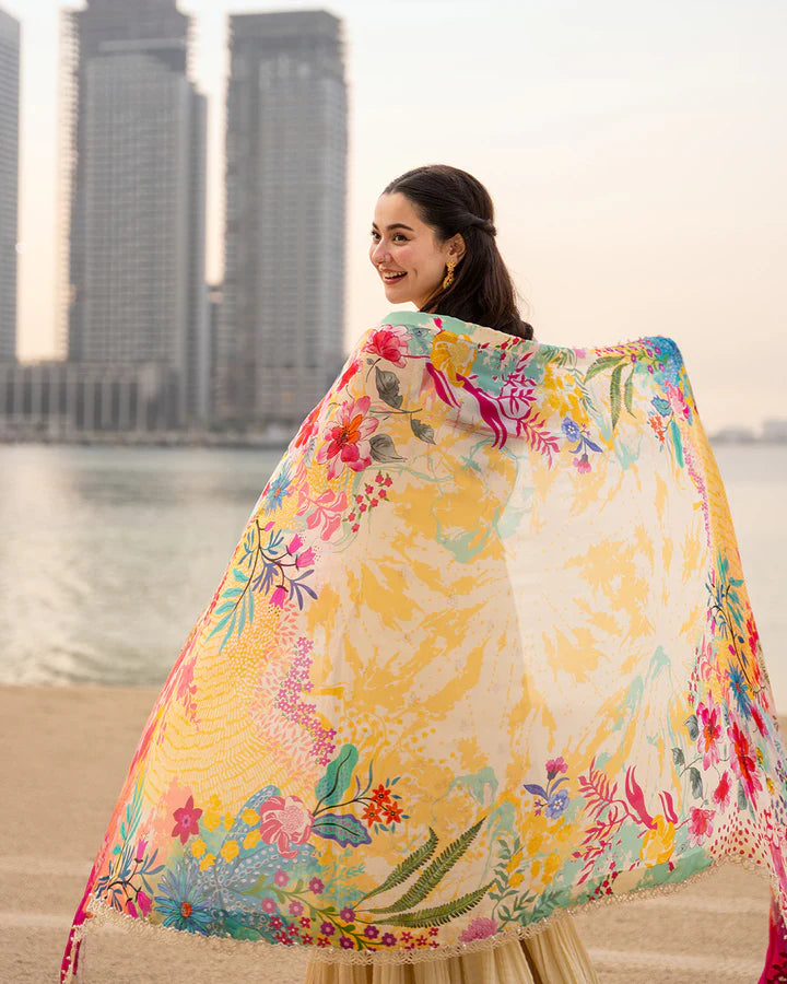 Back view of Hania Aamir wearing Faiza Saqlain Merjem vanilla lawn suit with vibrant floral dupatta