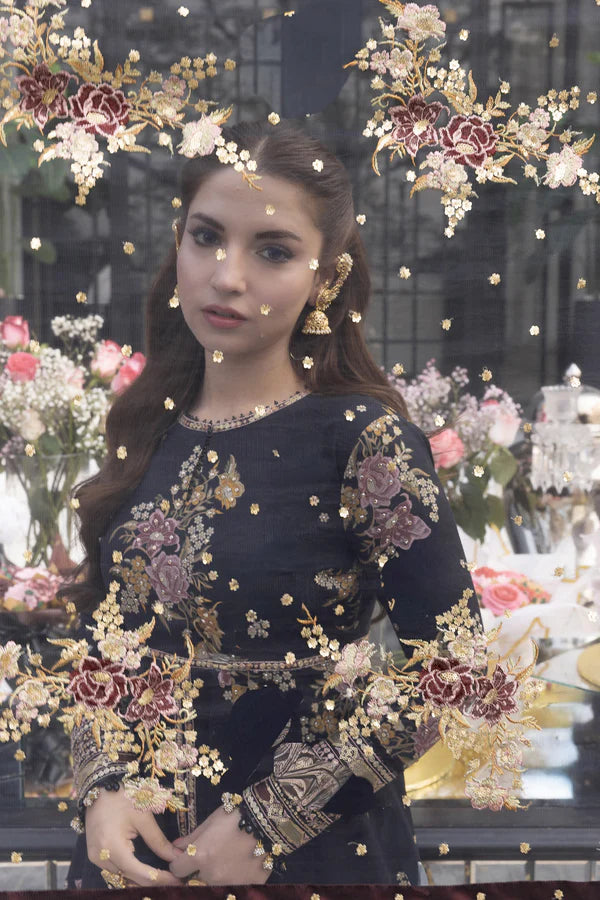 Close-up of So Kamal black lawn shirt with golden and floral embroidery details