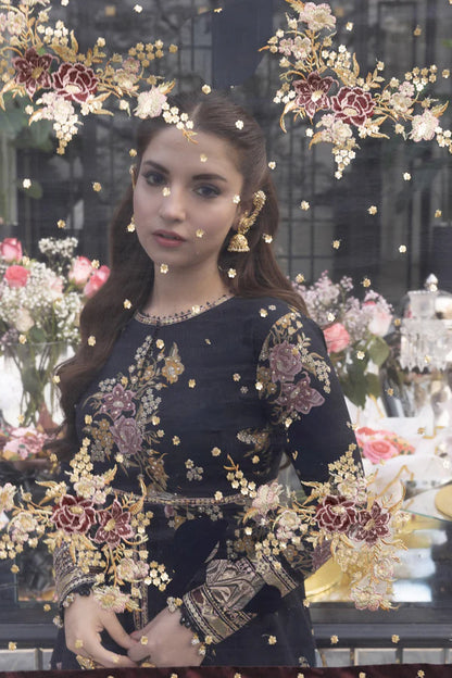Close-up of So Kamal black lawn shirt with golden and floral embroidery details
