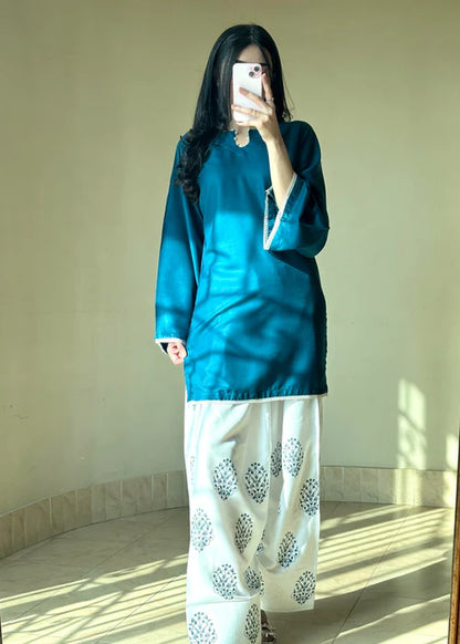 Style showcase of Tehzeeb Libas teal kurta set with white farsi shalwar, summer daily wear