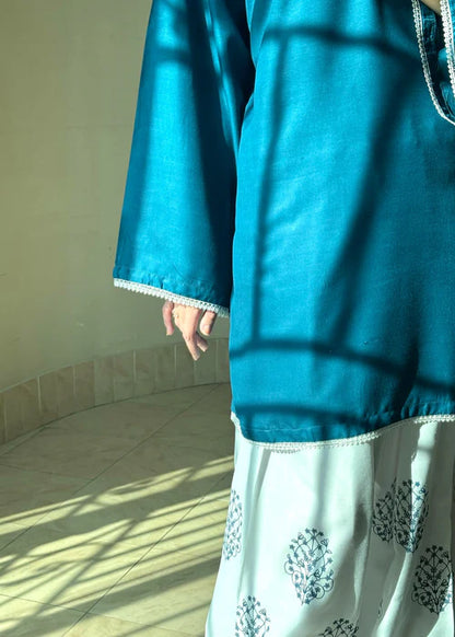 Close-up of teal silk kurta sleeves with lace detailing, Tehzeeb Libas casual wear