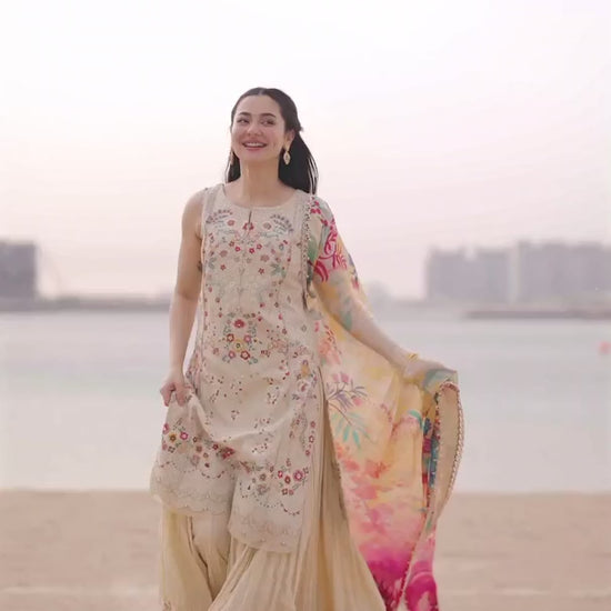 Hania Aamir featuring Faiza Saqlain Merjem 2026 collection, vanilla lawn 3-piece embroidered suit showcase video
