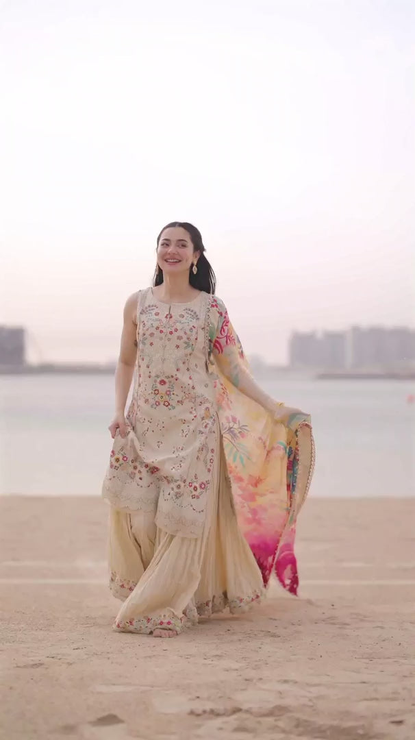 Hania Aamir featuring Faiza Saqlain Merjem 2026 collection, vanilla lawn 3-piece embroidered suit showcase video