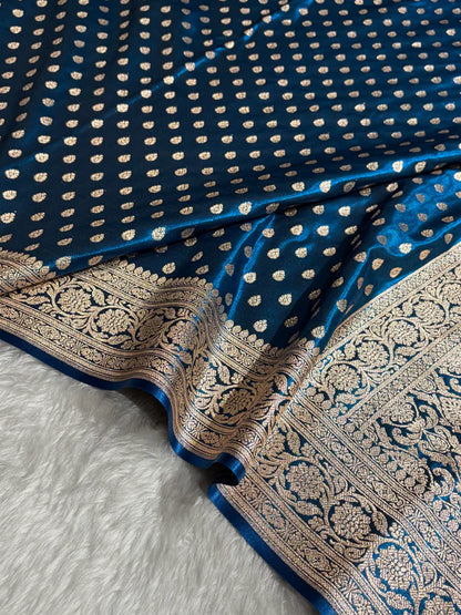 Side profile of model wearing Zaira German Blue Satin Silk Indian Saree, luxury traditional wear at Tajori Bangladesh